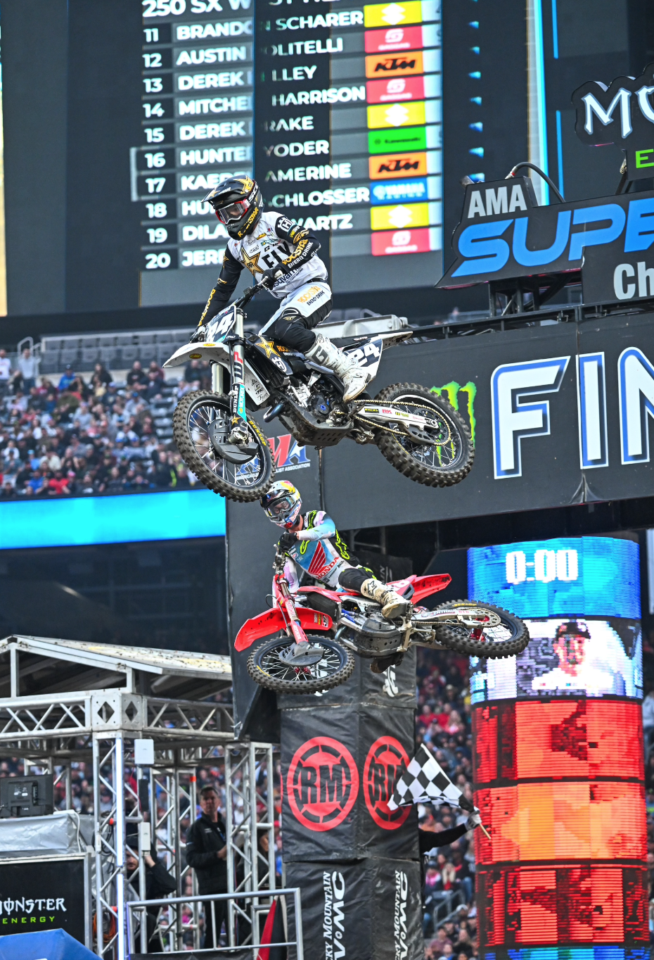 RJ Hampshire holds off Jett Lawrence in the 250SX West Region heat race win by just 0.452 seconds.