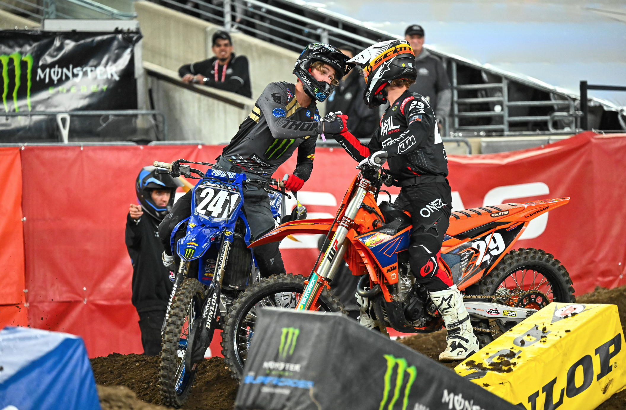 Daxton Bennick and Julien Beaumer shake hands after a close finish in the 250SX Futures main event.