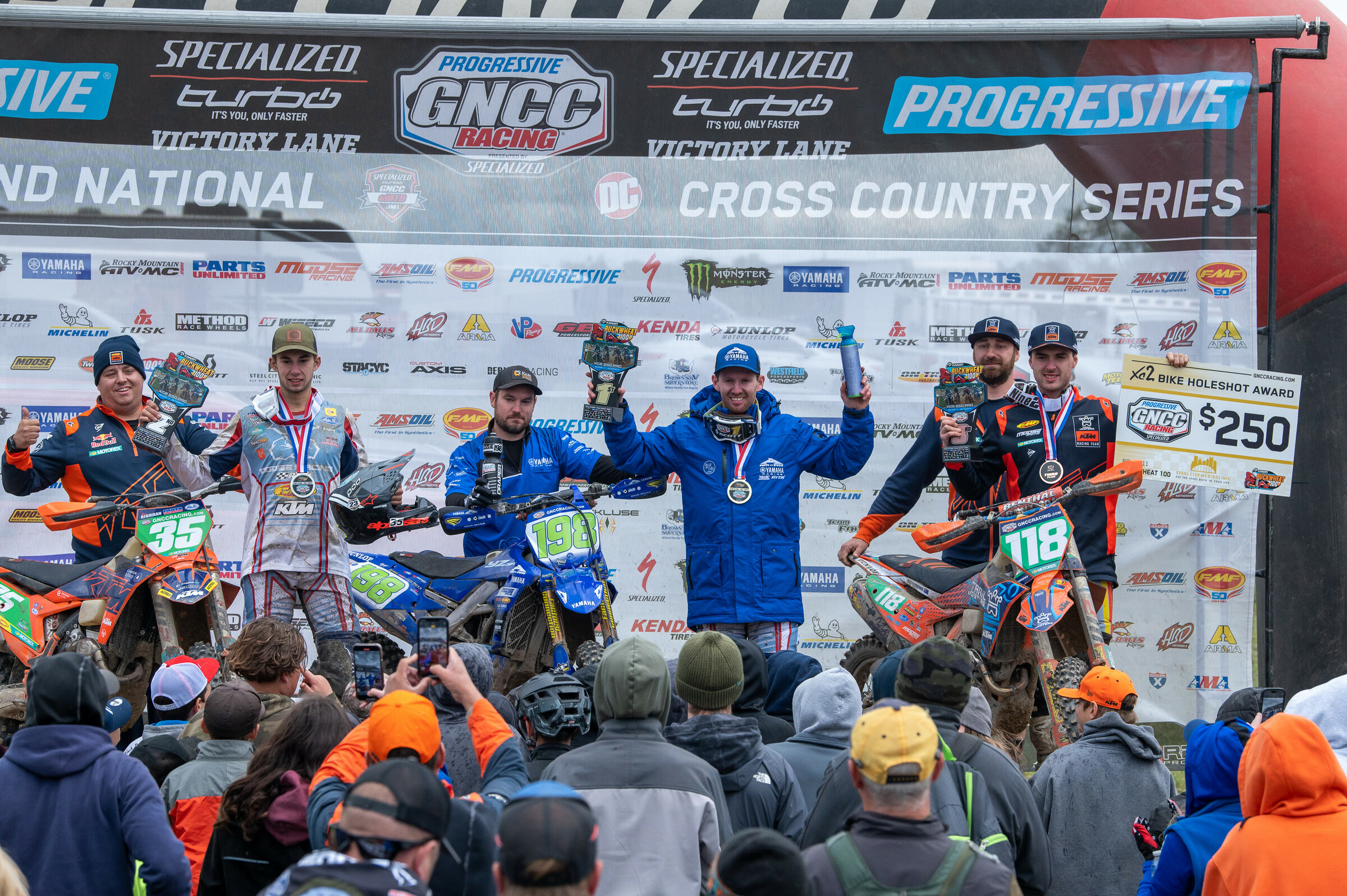 Liam Draper (center), Angus Riordan (left) and Mason Semmens (left) rounded out the top three XC2 250 Pro class finishers at round 11.
