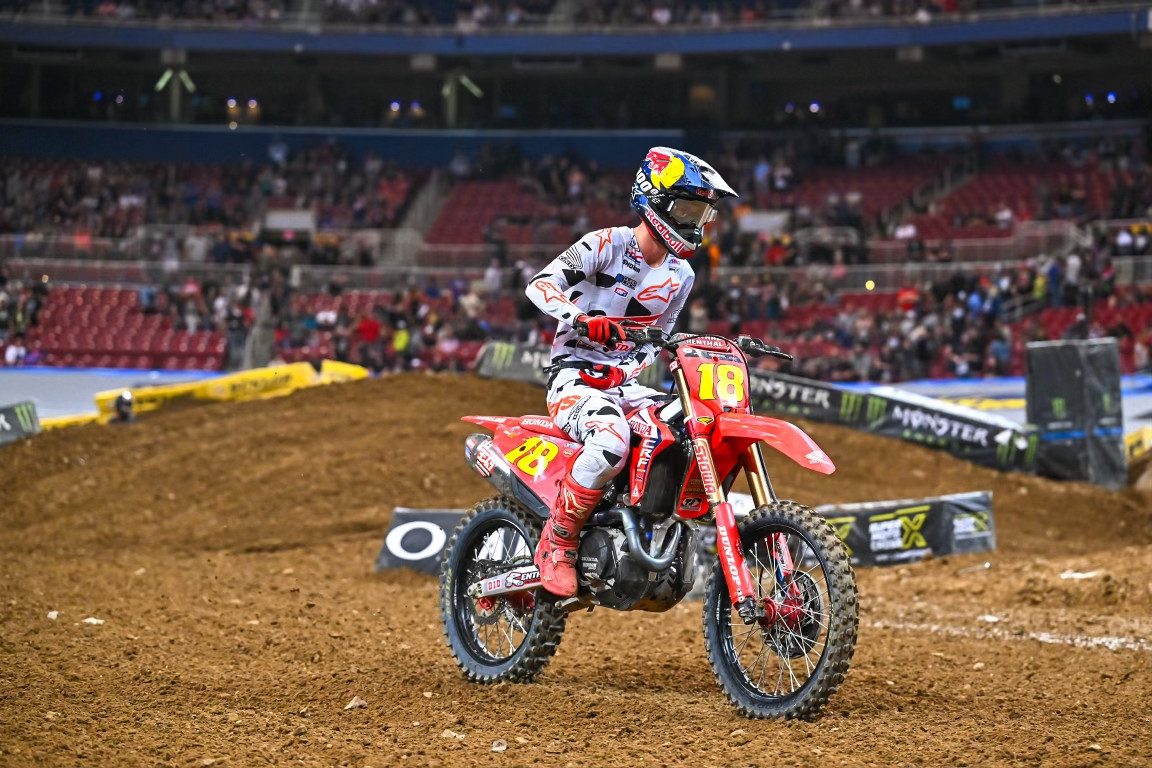 Jett Lawrence favors his left arm after hard, accidental, contact from Justin Barcia.
