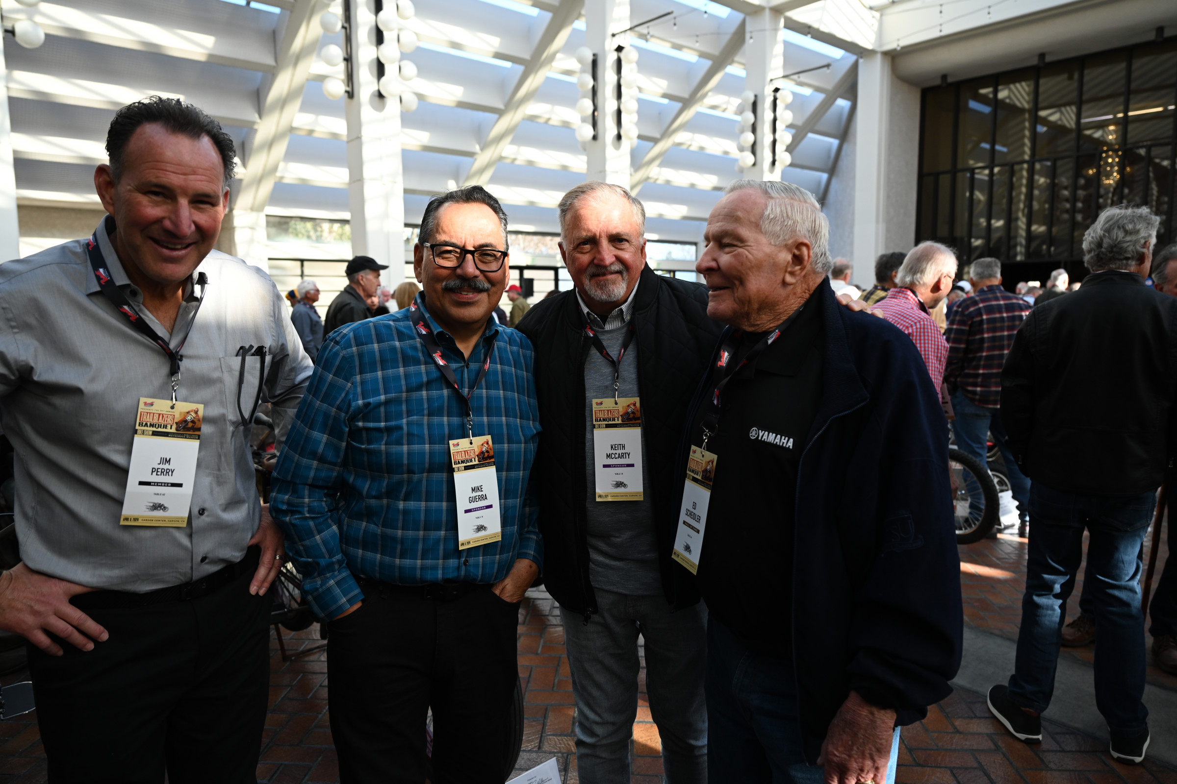 This reunion of previous Yamaha racing management is typical of the scenes in the courtyard during the Trailblazers bike show. From left: Jim Perry, Mike Guerra, Keith McCarty and Ed Scheidler.
