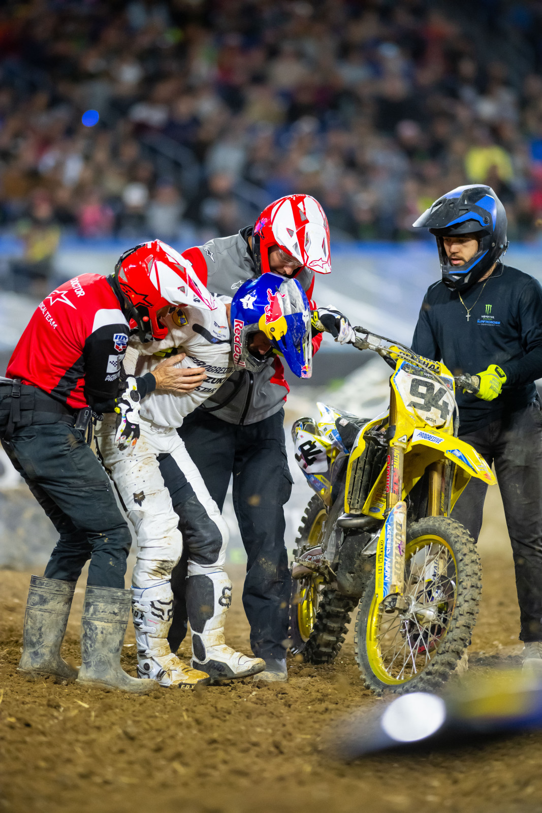 Ken Roczen is helped by the Alpinestars medical crew after a hard crash in the whoops while running in second place.