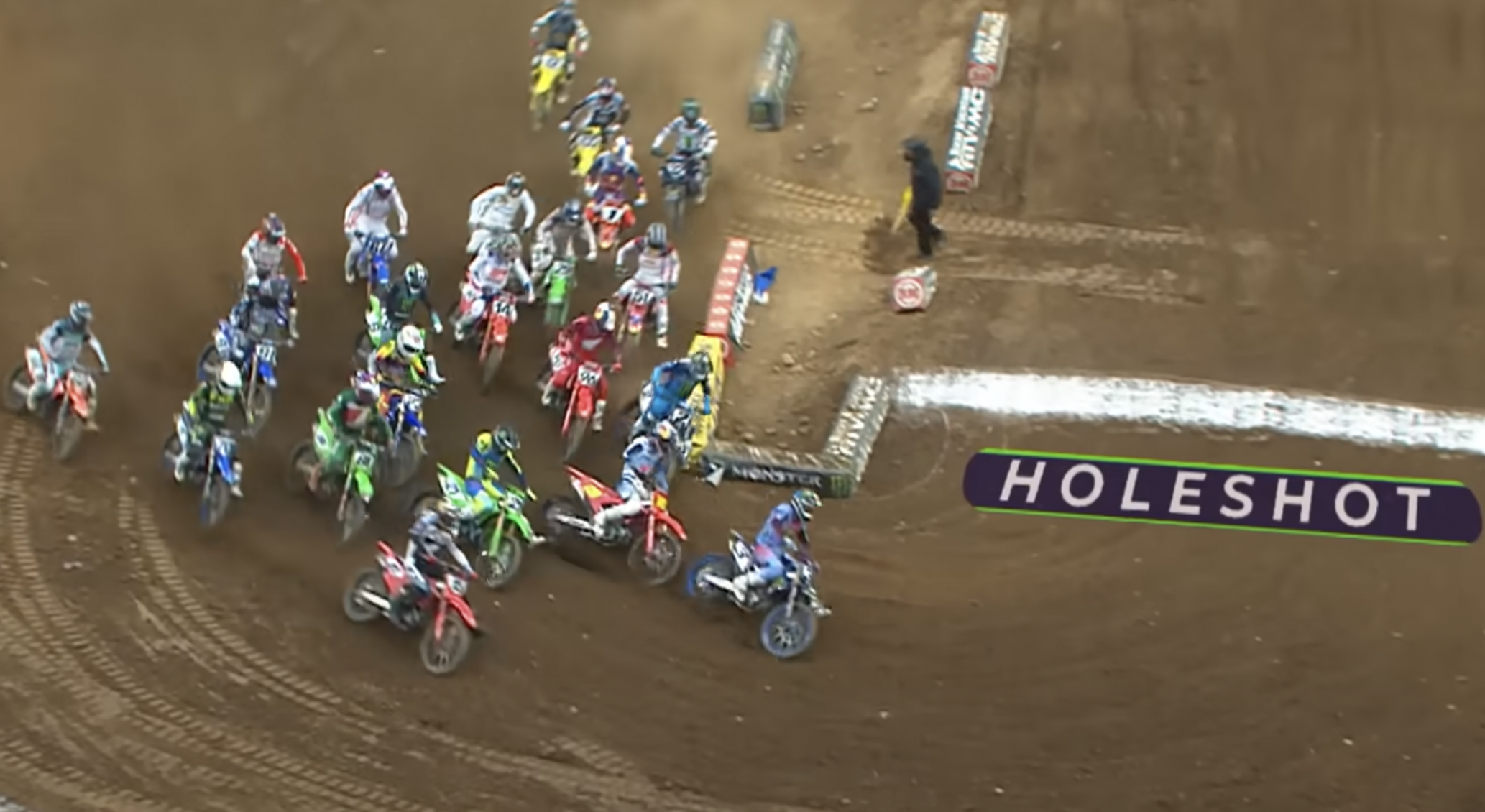 Lawrence in about the same spot in turn one in the main event, but this time he was trying to steer with the rear wheel to avoid pushing the front.