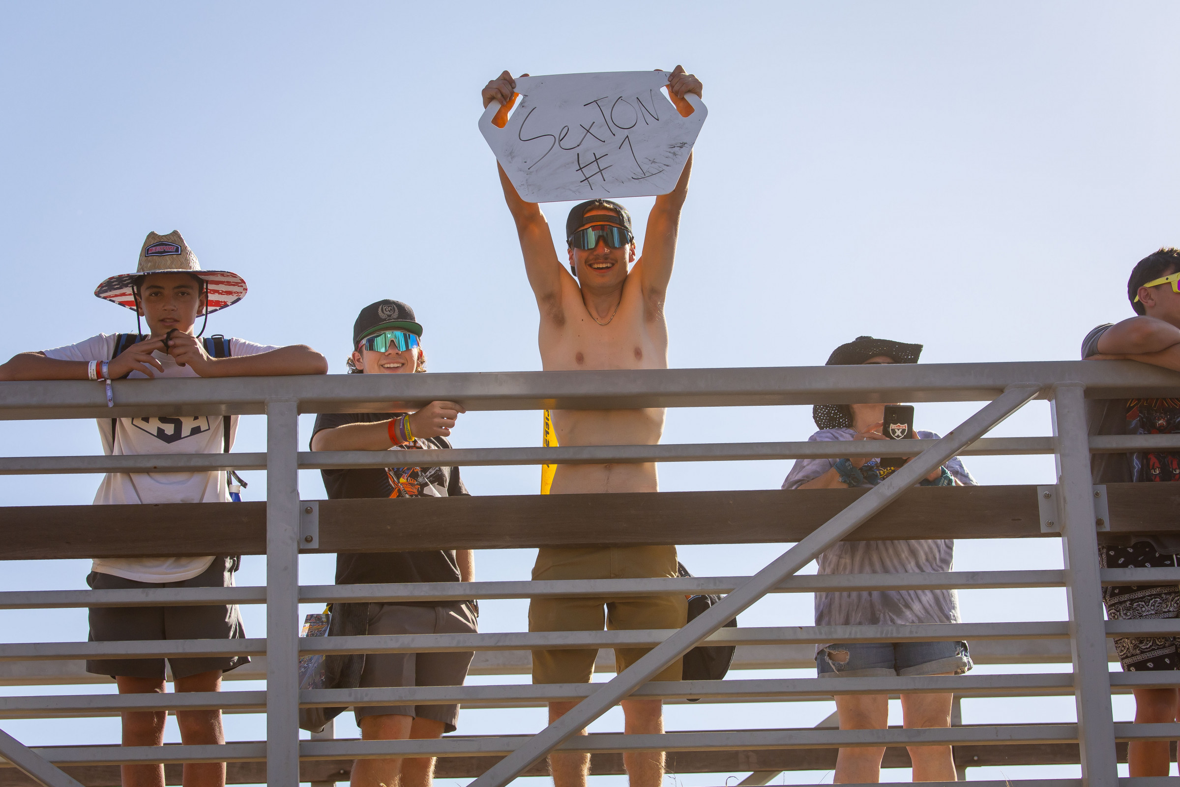 Cool pit board message, but the sticker on the back of that cell phone on the right is even cooler.