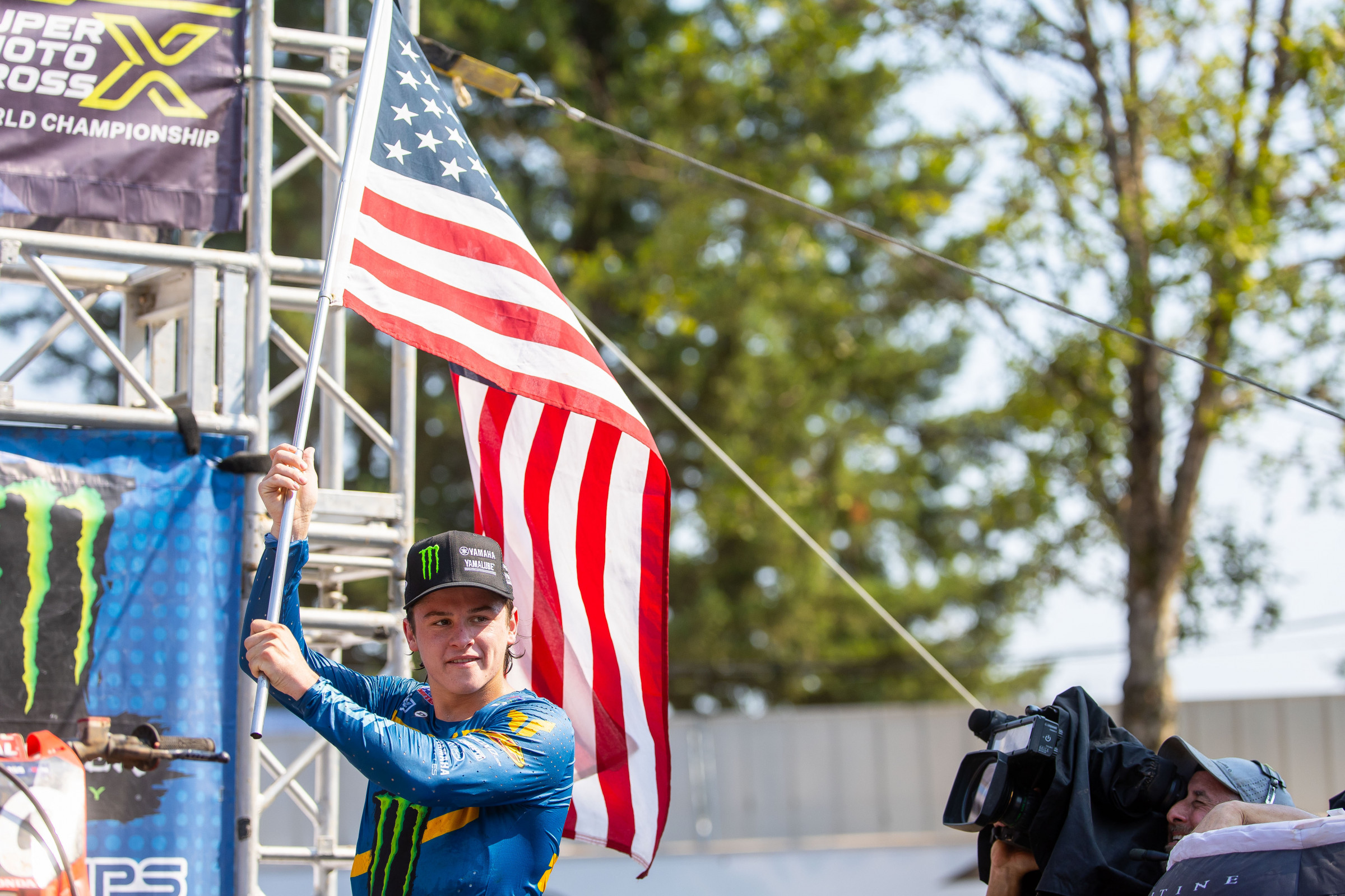 Fans always seem to bring American flags to the podium for Deegan to wave.
