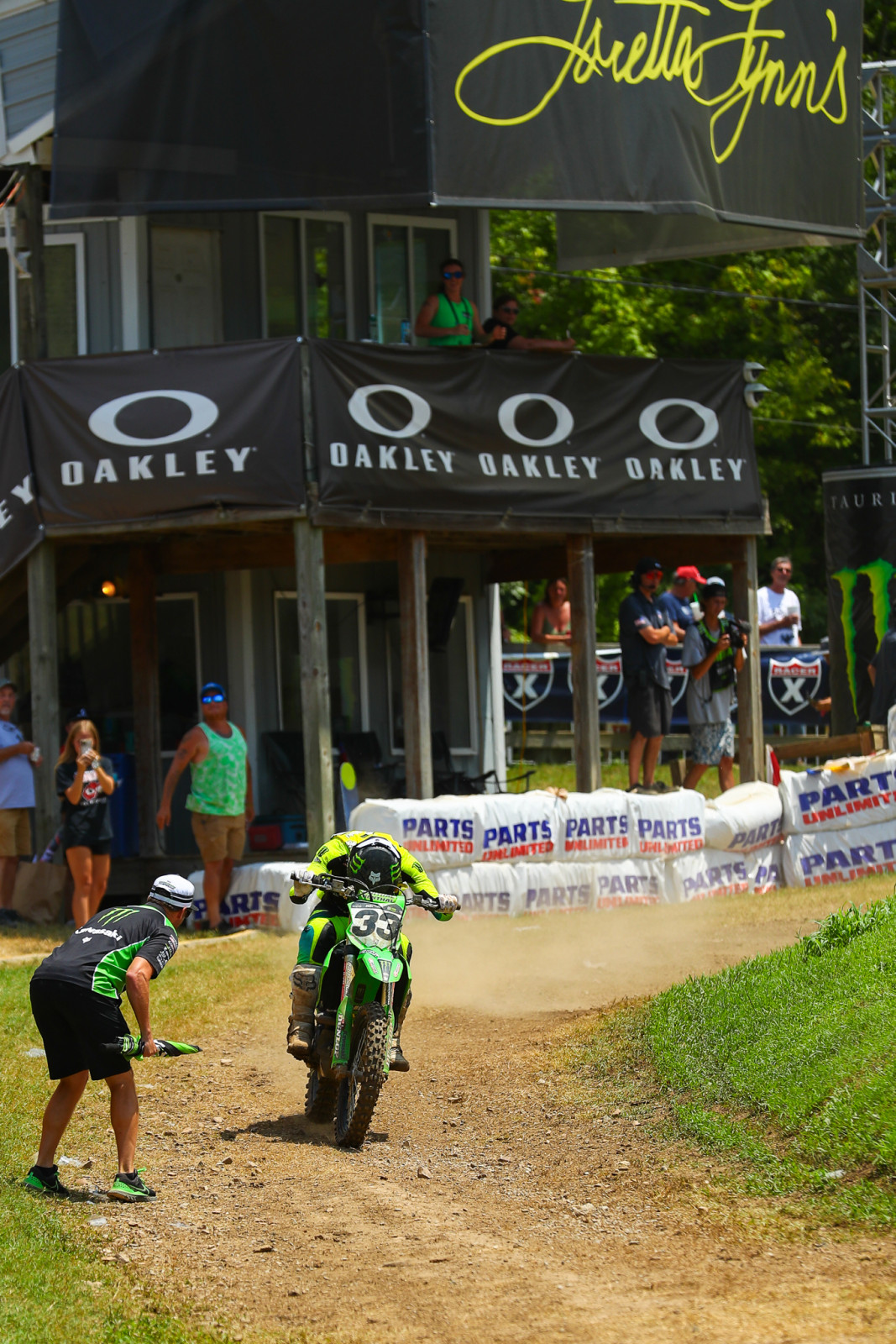 Ryan Holliday yelling for Drew Adams at Loretta Lynn's Ranch after Adams claimed the moto win and the title.