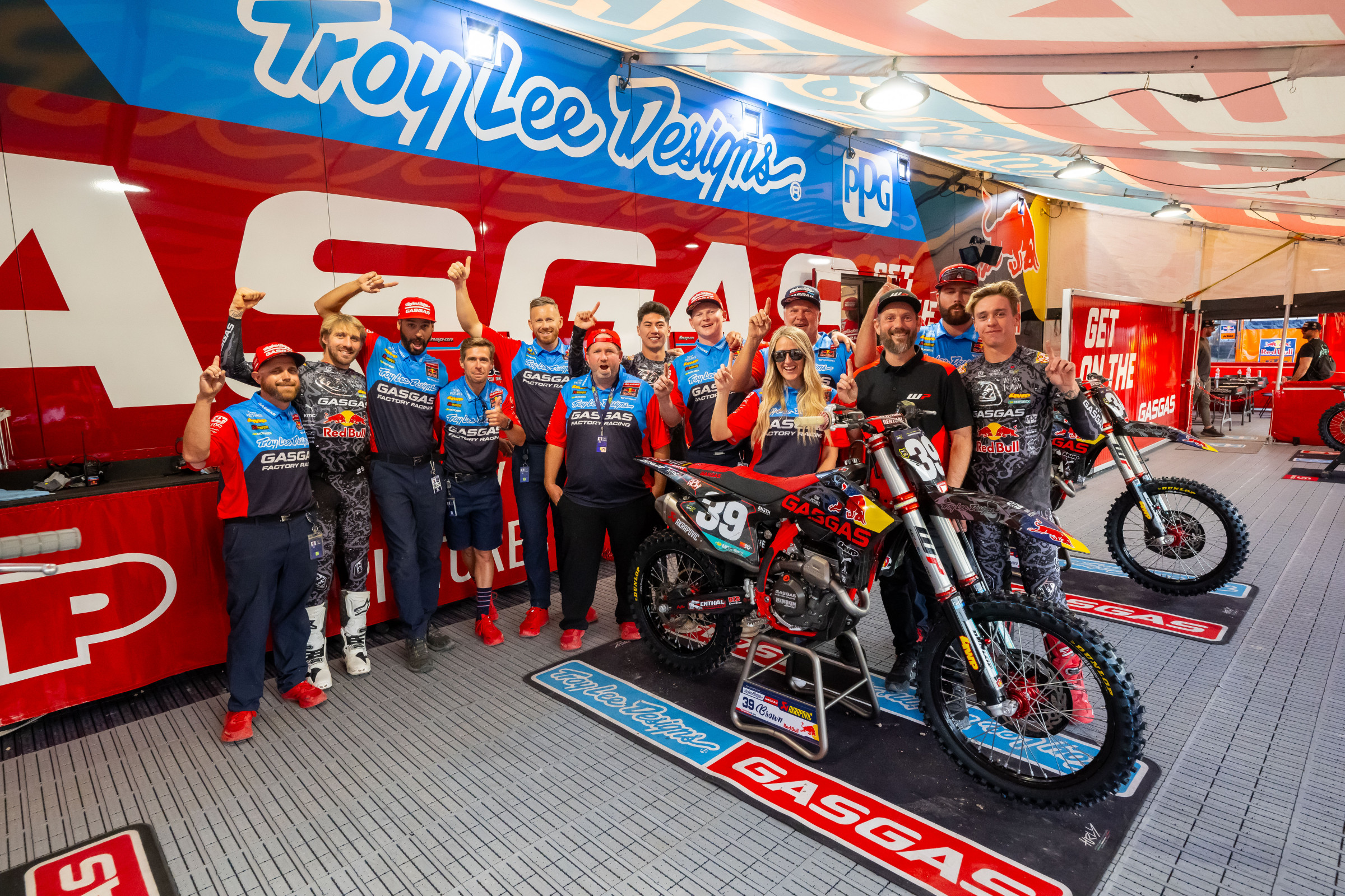 The Troy Lee Designs/Red Bull/GasGas team posing at their final race as a team.