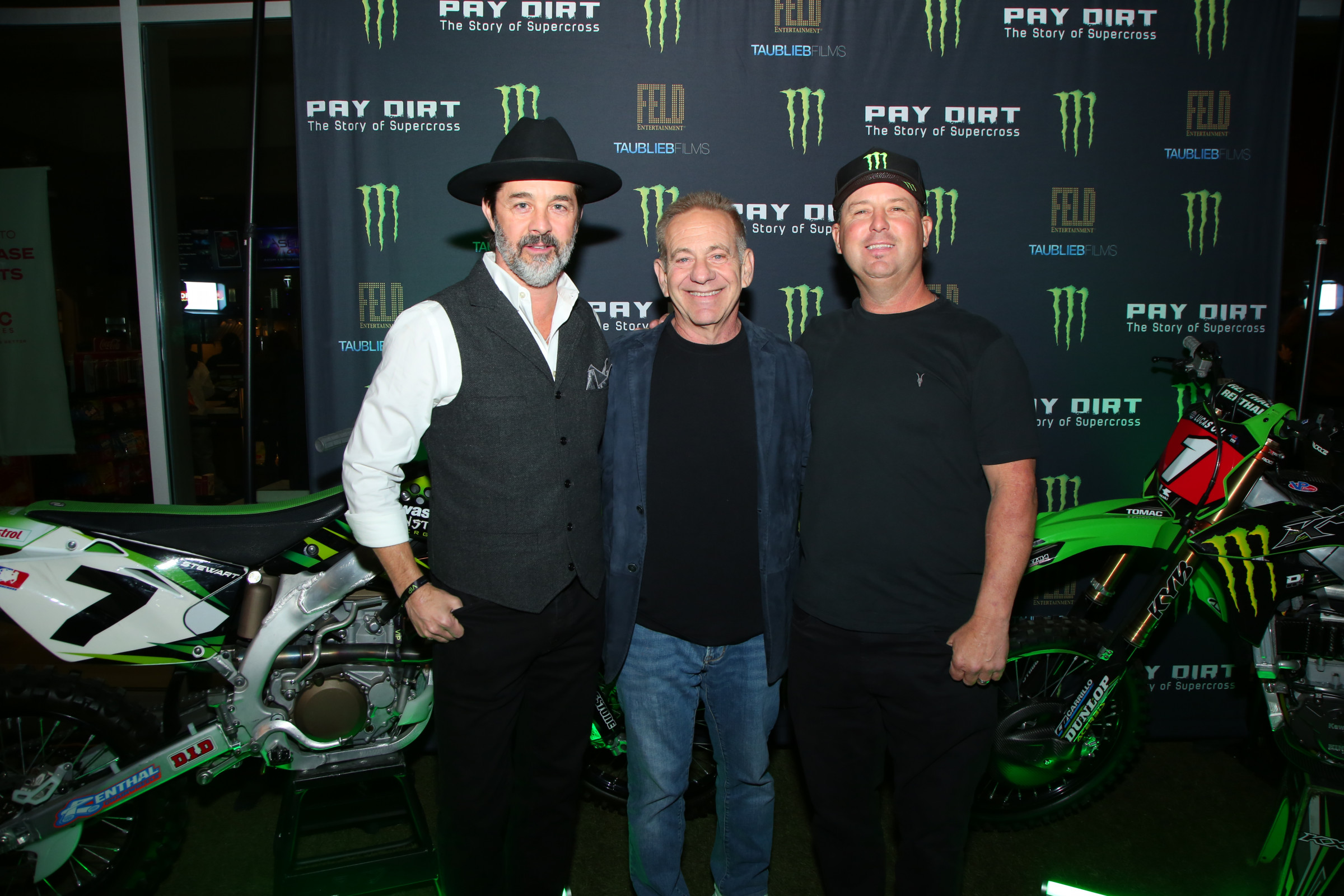 Jeff Emig and Jeremy McGrath flank director Paul Taublieb