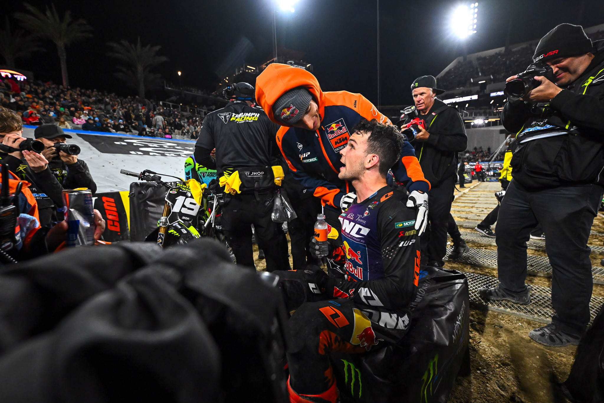 Chase Sexton congratulates Julien Beaumer on his first win in the pro ranks.