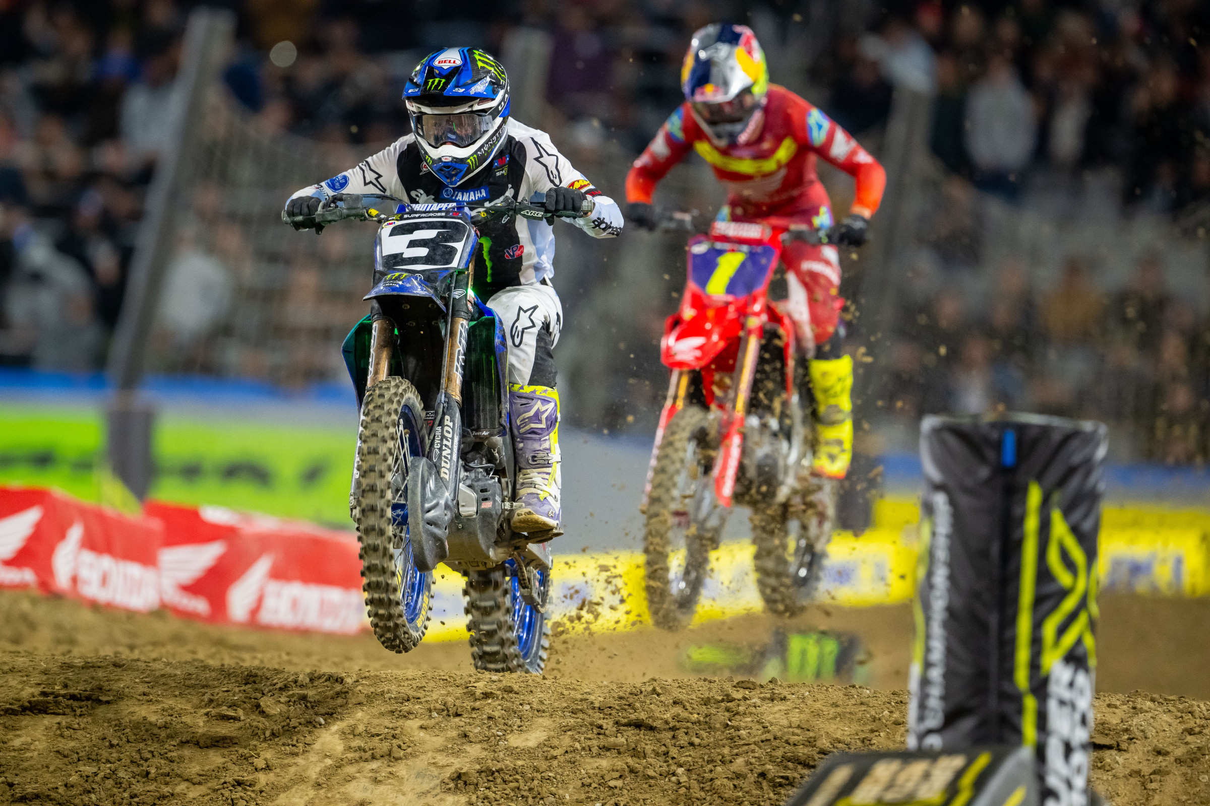 Eli Tomac leading Jett Lawrence to a win in San Diego.