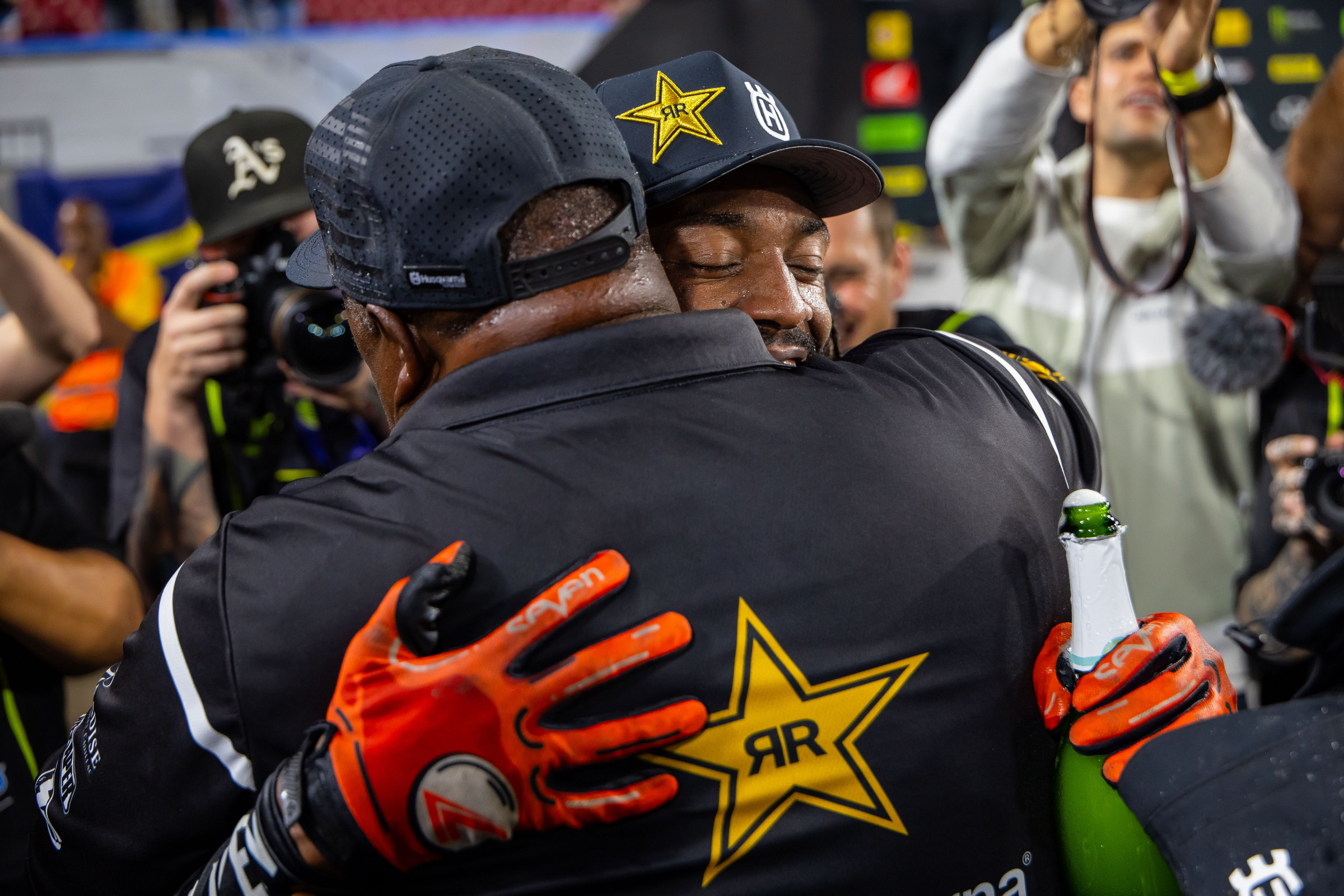 Malcolm Stewart embraces his dad.