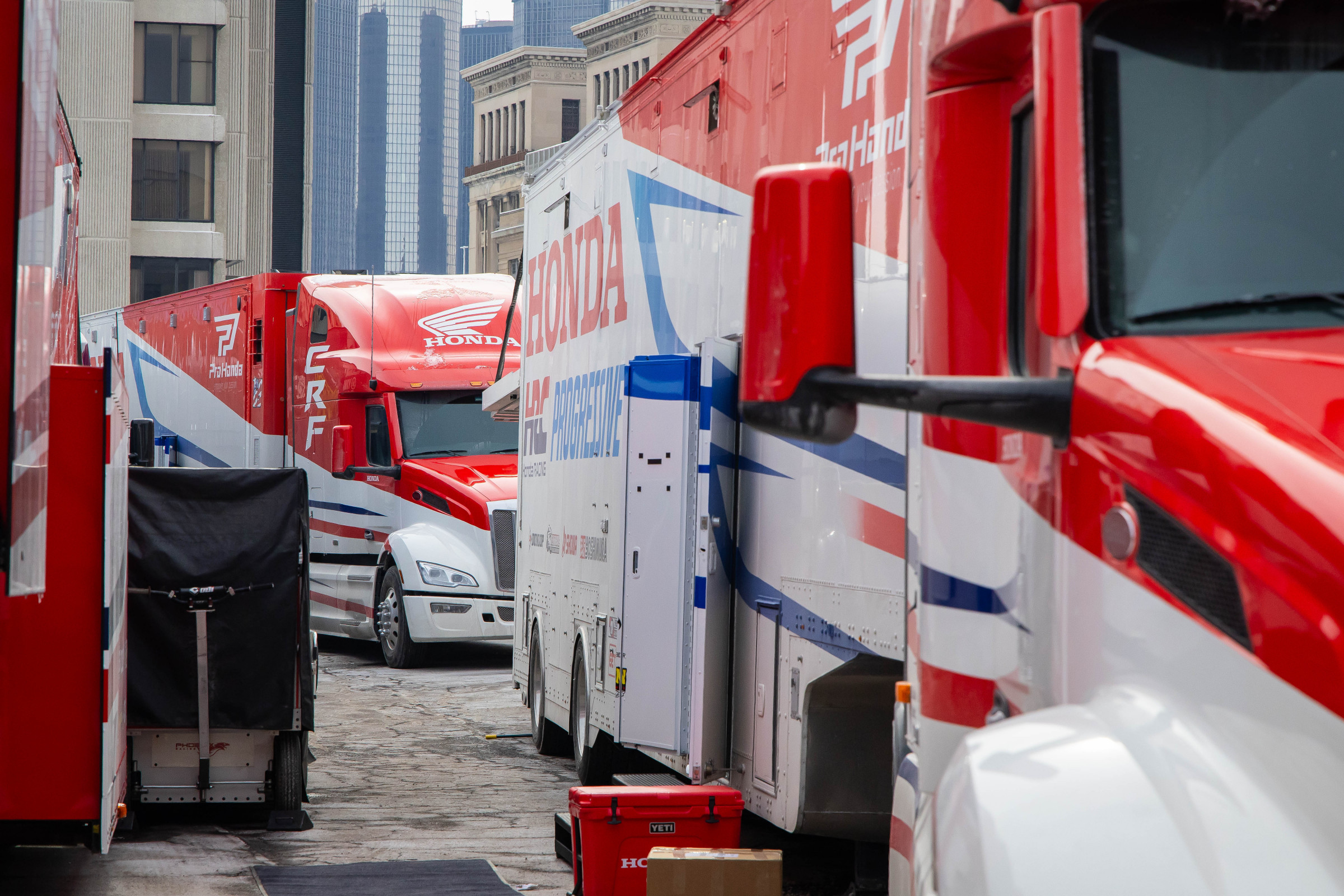 Honda HRC Progressive might be without any 450SX riders right now, but Phil ain't getting the call to pit out of these trucks.
