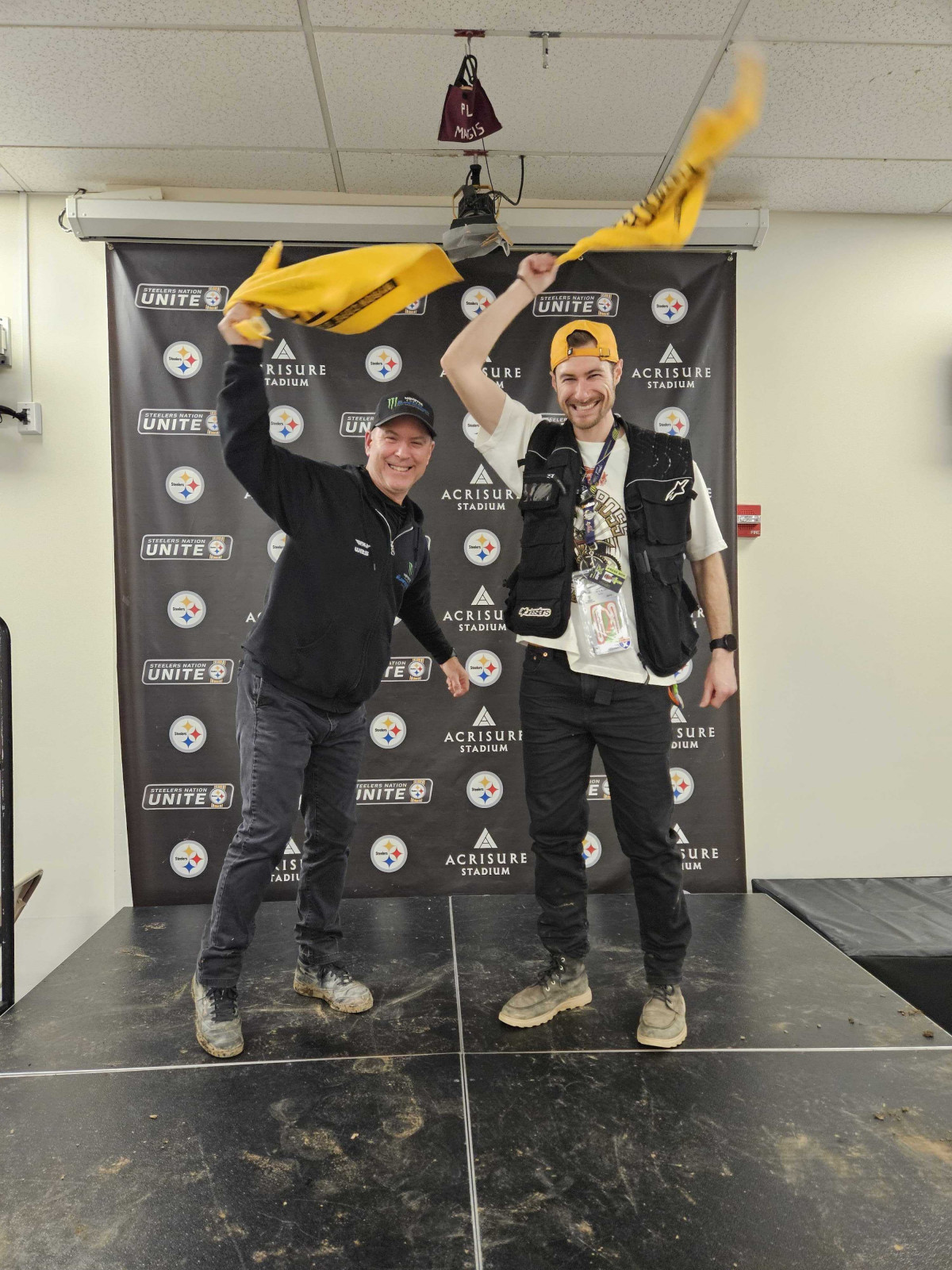 Sean Brennen and Mitch Kendra had to get in one Terrible Towel wave before they left for the night.