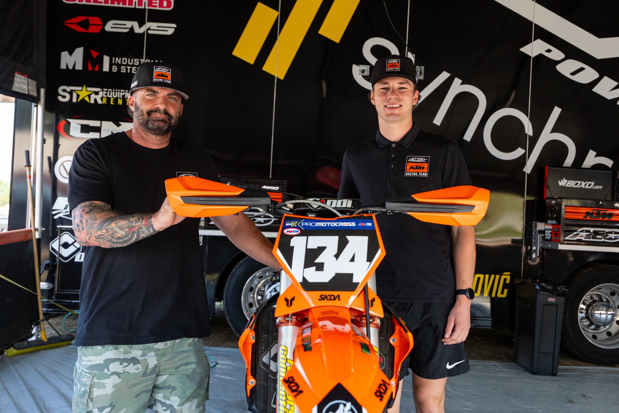 Team owner Jeremy Scism and Avery Long