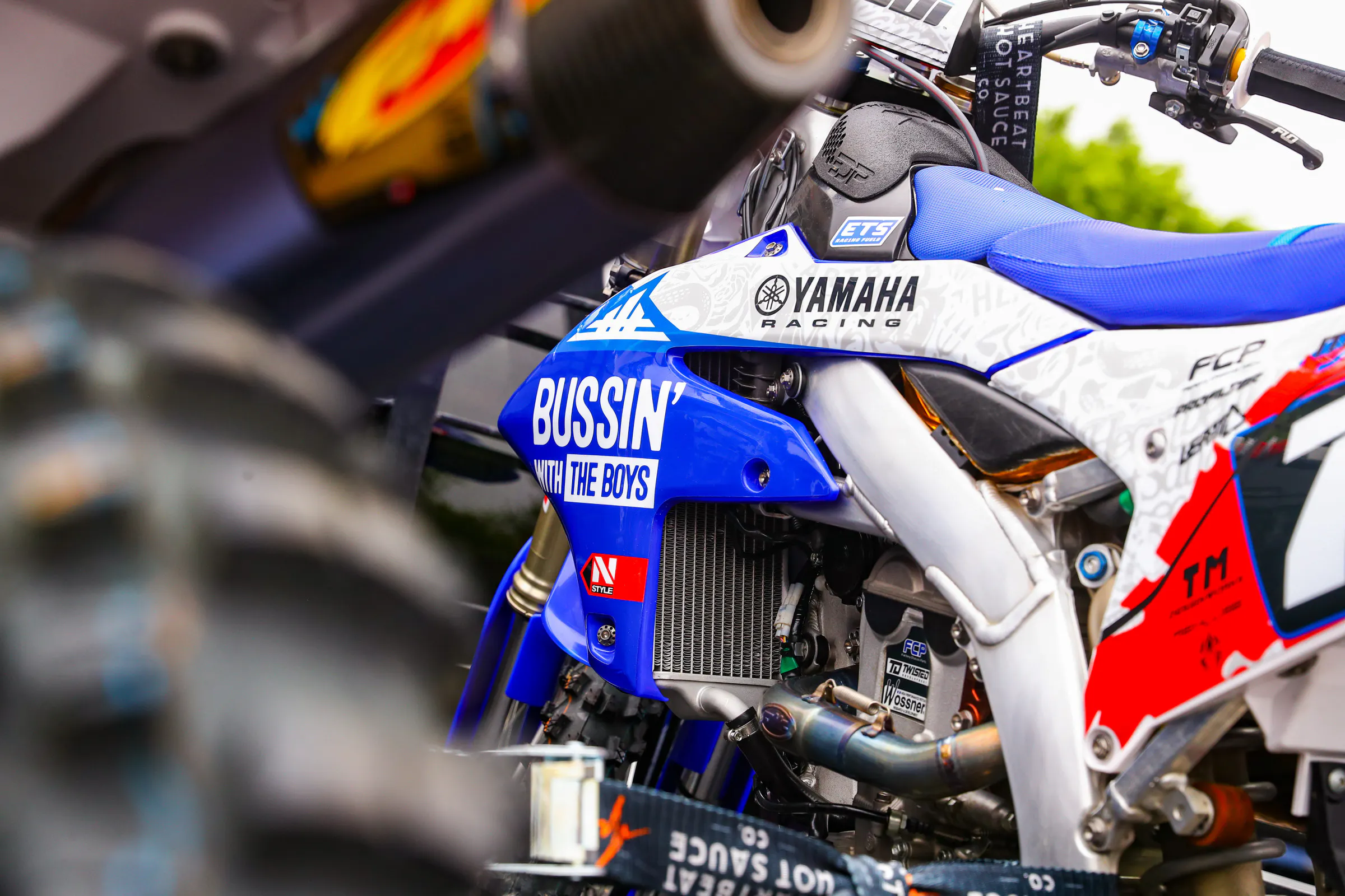 Team Solitaire with the Bussin' with the Boys Podcast graphics.