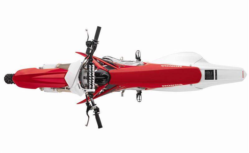 The 2009 CRF450R is much slimmer than previous incarnations. It’s also easy to see how much nicer the plastics fit together from the rear fender, through the numberplates, and up through the radiator shrouds.