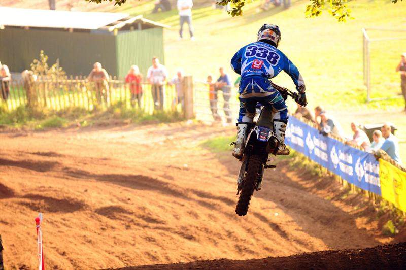 Osborne emerges from the trees back out to the sunlight.