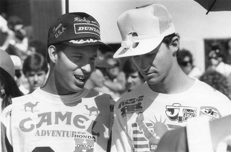 Me and RJ. This was during the opening ceremonies at the '86 Motocross des Nations in Italy. I spotted this guy with a solar-fan hat and traded him my custom Dunlop hat for it. As soon as I went back under the umbrella, it quit, so I think RJ was busting my balls, saying, 