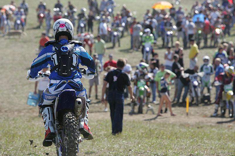 Team AmPro Yamaha's Jason Raines makes his way to the starting line.