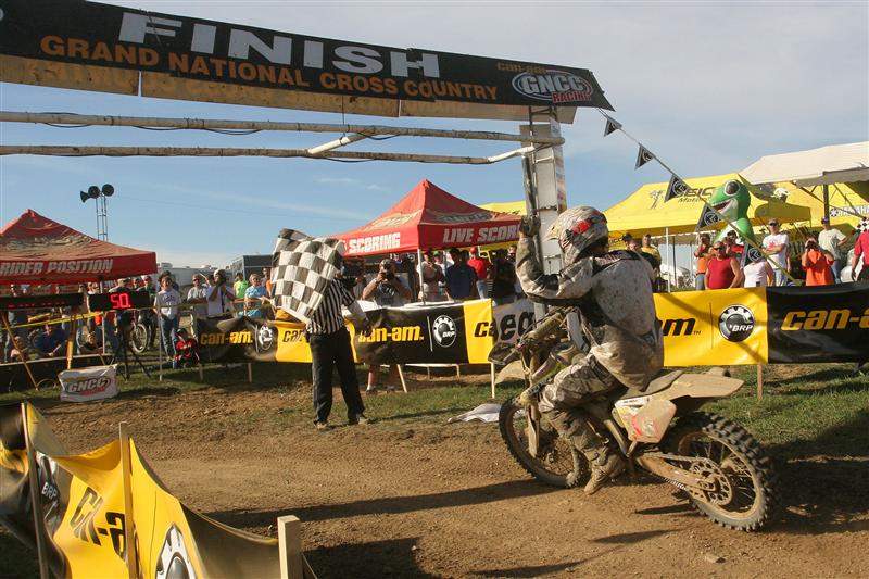 Paul Whibley takes the checkered flag.