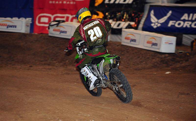 Jeff Matiasevich is riding a Kawasaki KX450F and wearing #20