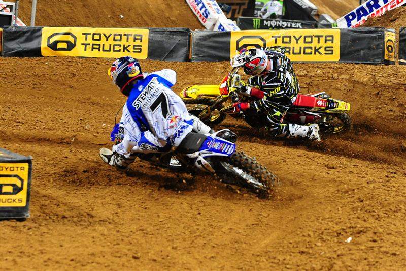 Reed (1) led lap three, but Stewart (7) used this move to set up Reed for a pass just before the finish line.