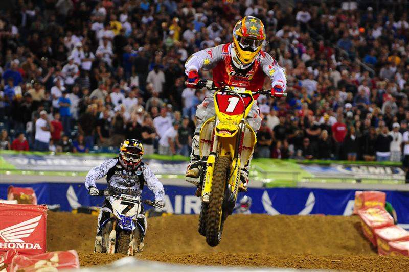 Reed (1) led the first 14 laps of the main event in front of rival James Stewart (7).