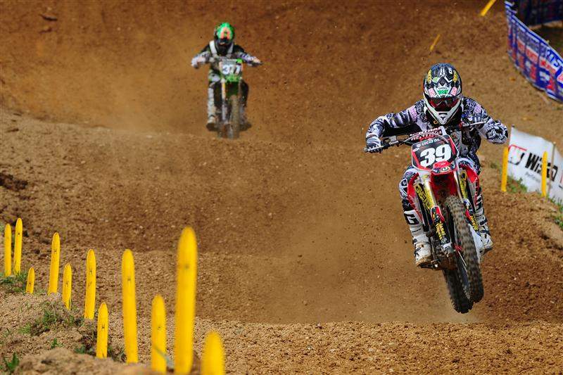 Trey Canard finished second in the first moto and led most of the second moto, putting himself in a position for the overall, until going over the bars hard after the two-lap board came out. He broke his right wrist.