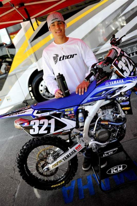 Gautier Paulin is ready for his first ever AMA Supercross. He's pitted behind the Star Racing Yamaha rig, and is being coached by David Vuillemin. And in completely different news, he has the biggest hands in the history of motocross.