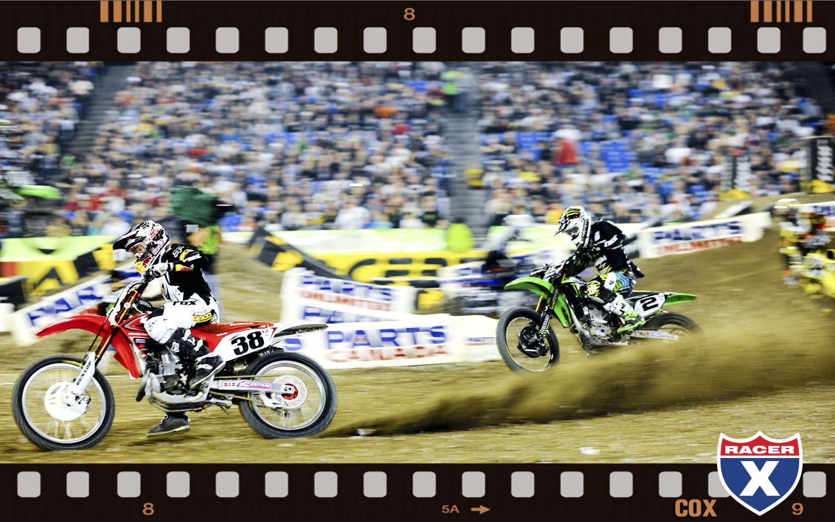 Trey Canard leads Ryan Villopoto and Ryan Dungey onto the start straight.