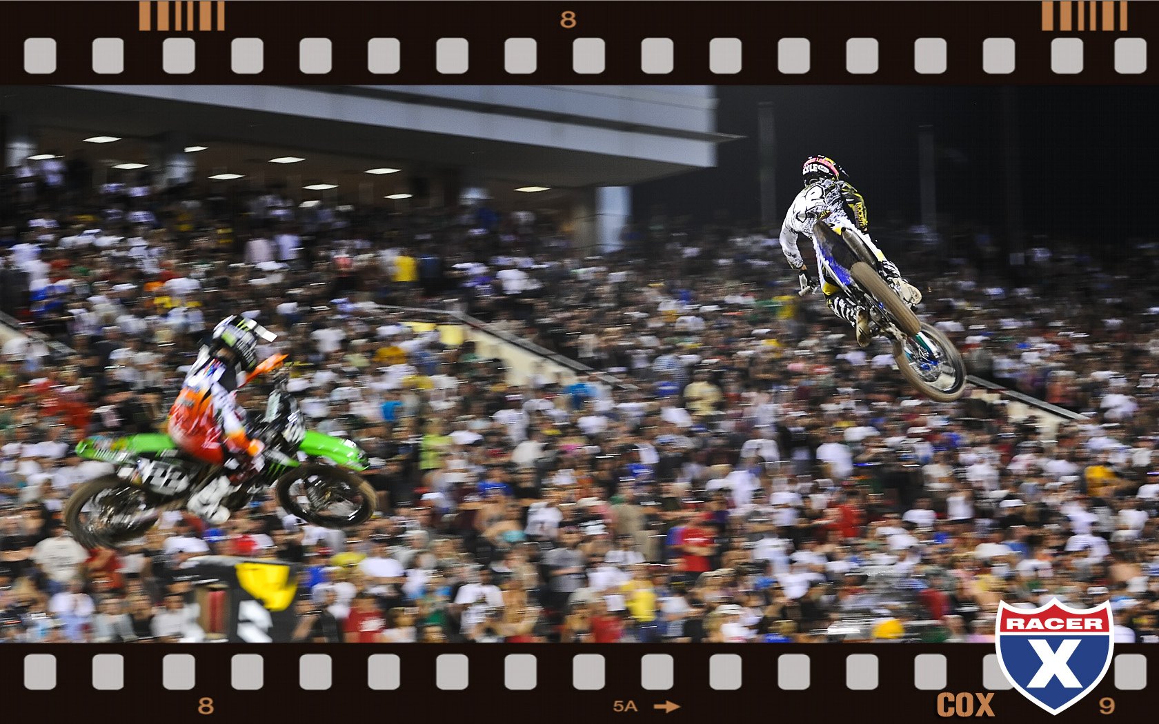 Kyle Cunningham leads Chad Reed in their heat race.