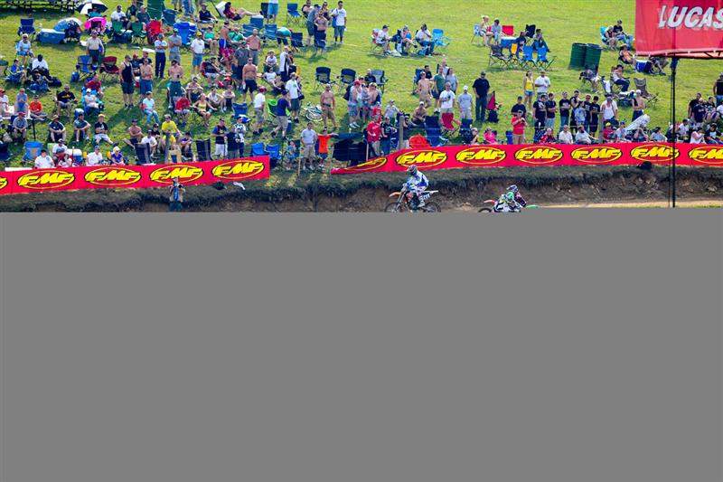 Blake Baggett and Dean Wilson hitting the big double at the bottom of the hill from the inside in 250cc practice.