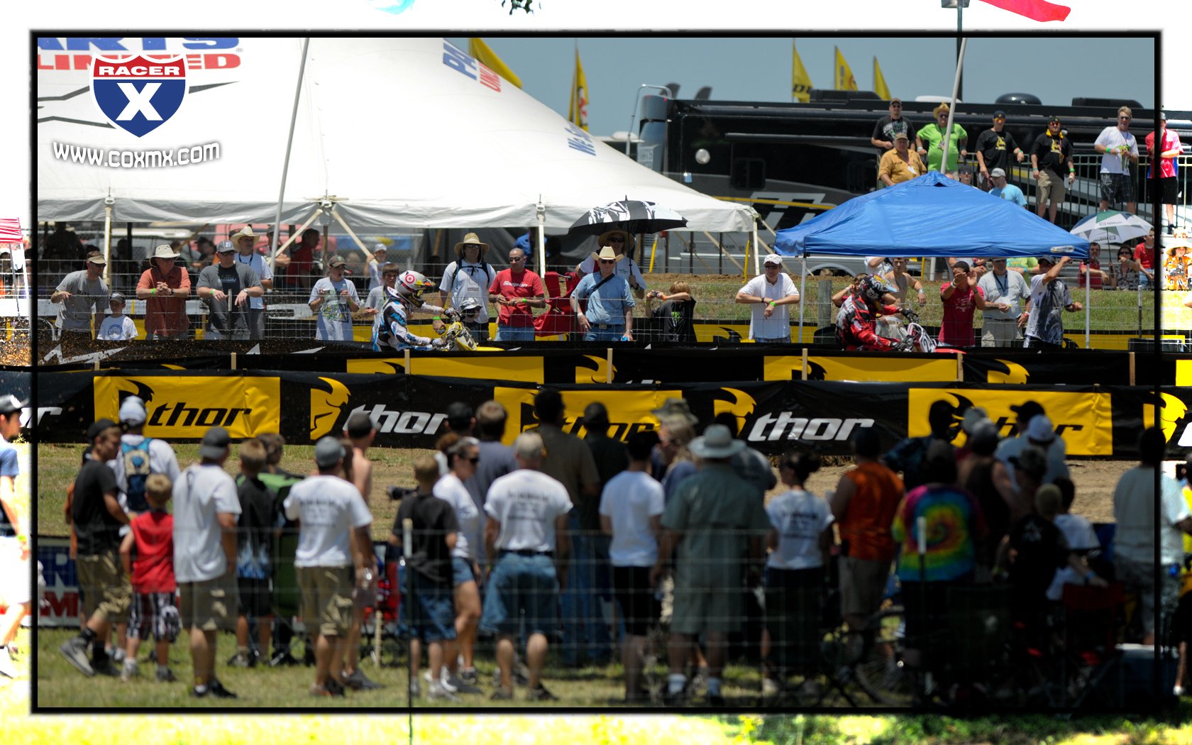Metcalfe leads Dungey as fans look on.