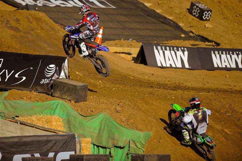 Hansen's mistakes let Josh Grant (33) catch up, and then ultimately pass him.