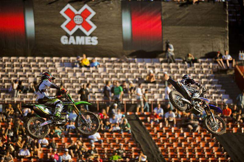 Grant leads over the finish-line jump with a few laps to go.