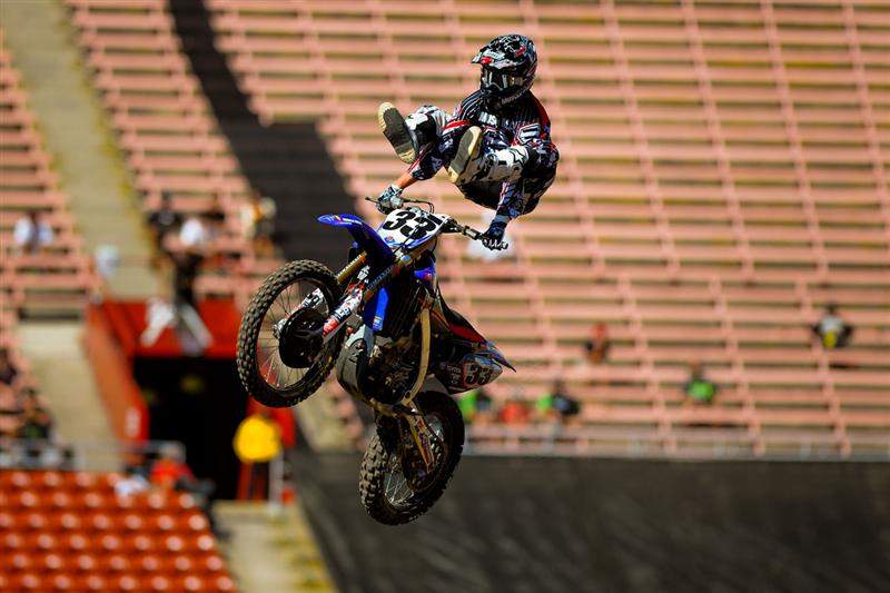 Grant celebrates his heat-race win with a heel-clicker.