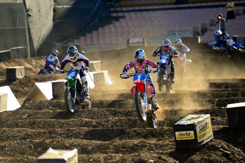 By the time the girls hit the whoops on the first lap, Ashley Fiolek (1) had the lead. Here, she leads Price (4), Jessica Patterson (2) and the rest of the field.