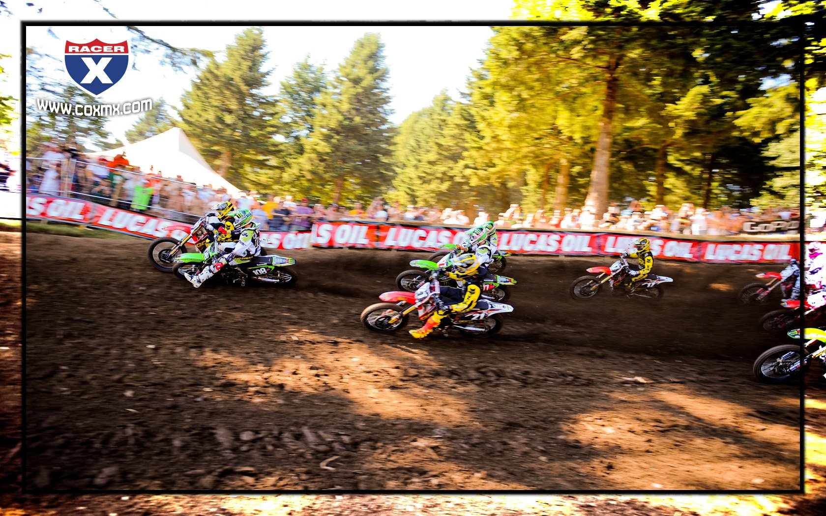 Trey Canard (38) and Dean Wilson (108) battling for the moto-two holeshot.