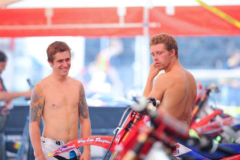 Wil Hahn (left) and Tommy Hahn (right) talk things over in Wil's TLD Honda pit. Wil is back for the first time since injuring his shoulder a few rounds ago.
