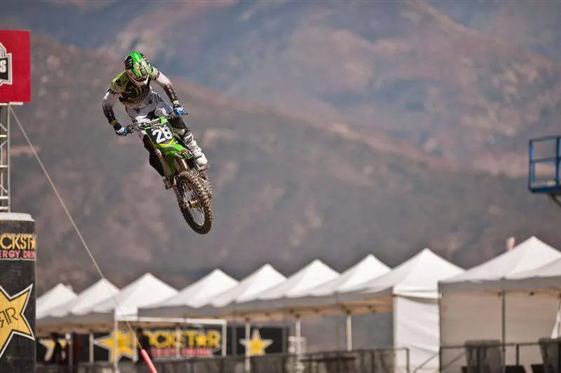 Rattray jumps over the big finish-line double in front of the grandstands at Pala Raceway.