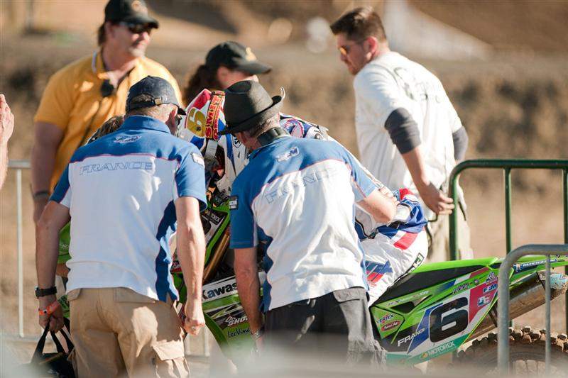 France's Boog dropped out after a couple laps. He went down in the first turn, then as he fought back toward the front, he went down again, hurting his leg. His status for tomorrow us uncertain.