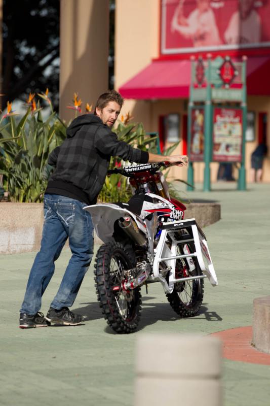 Lars Lindstrom takes Chad's bike inside