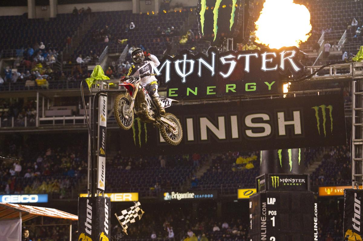Reed throws a fist pump over the finish line