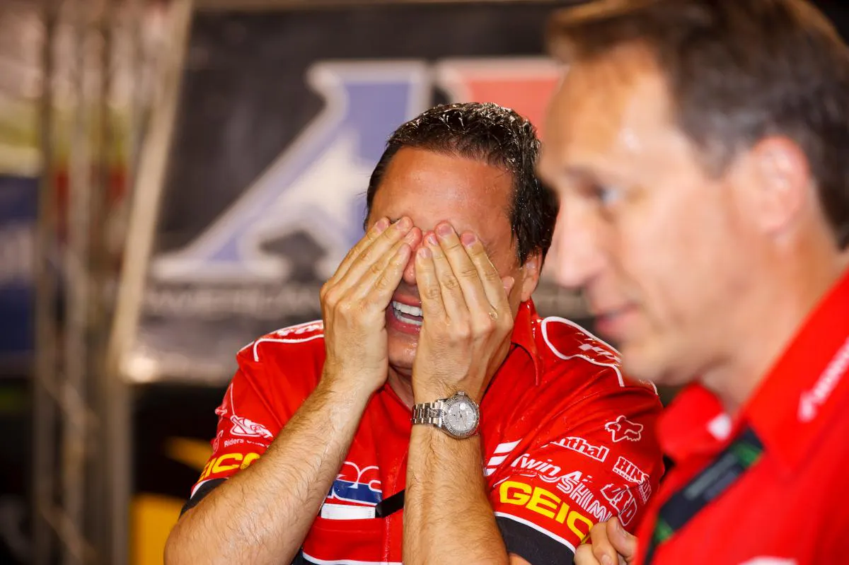 Honda's Bill Savino gets a champagne eye wash