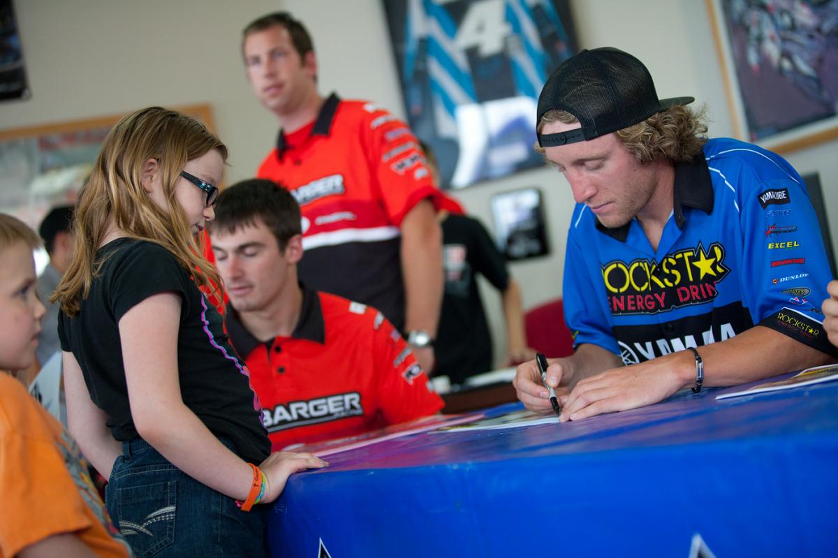 Ricky Dietrich and Levi Kilbarger signing for the kids.