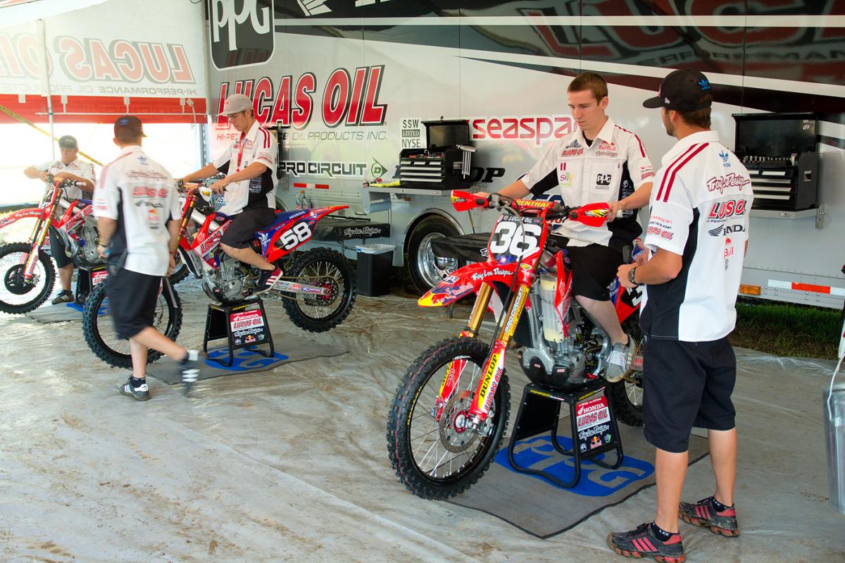 Cole Seely, Travis Baker, and the TLD Honda team getting their bikes dialed in.
