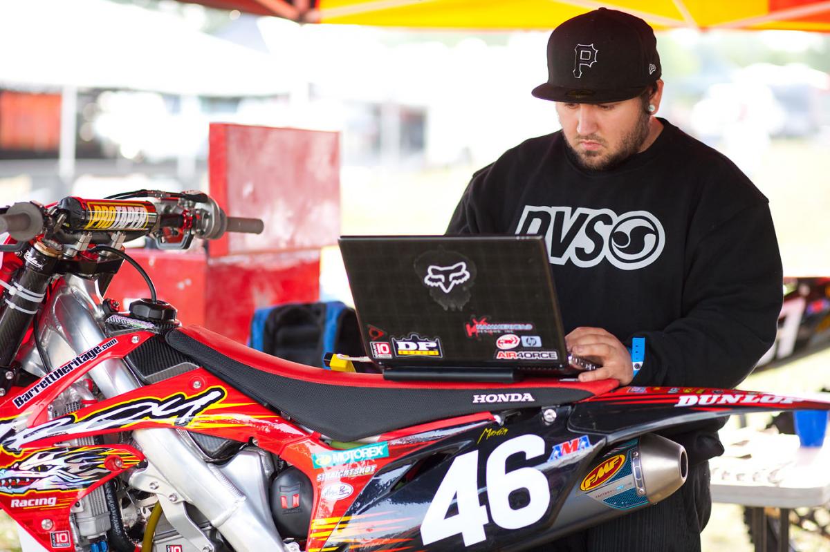 Nate raises the rev limiter on Alex Martin's bike.