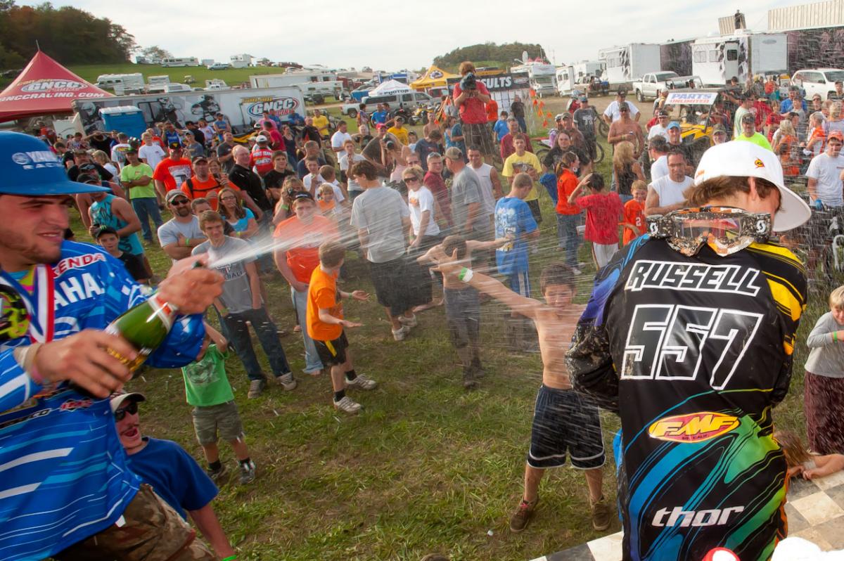Thad DuVall (left) celebrates Kailub Russell's (right) first career XC1 win. 