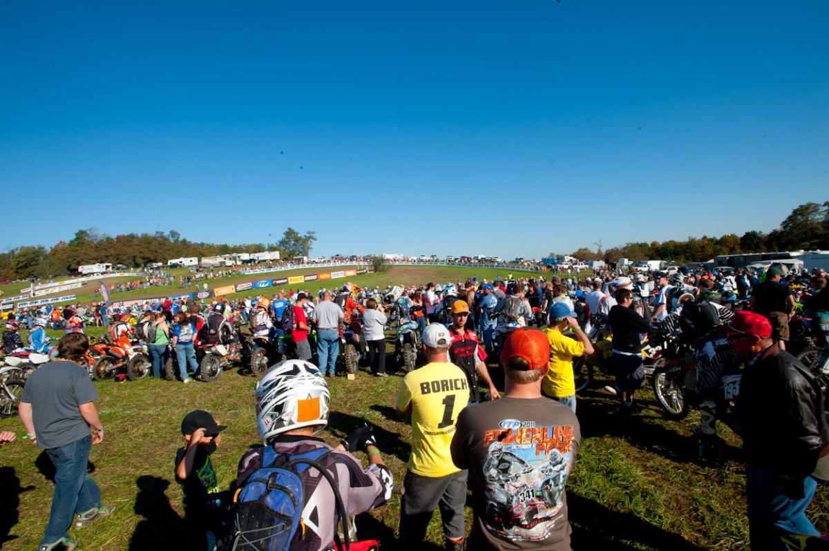 Riders and crew line the start