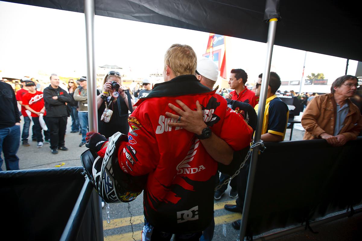 Short taking photos with the fans at A1